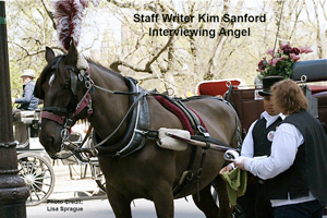 Staff Writer Kim Sanford 
Interviewing Angel